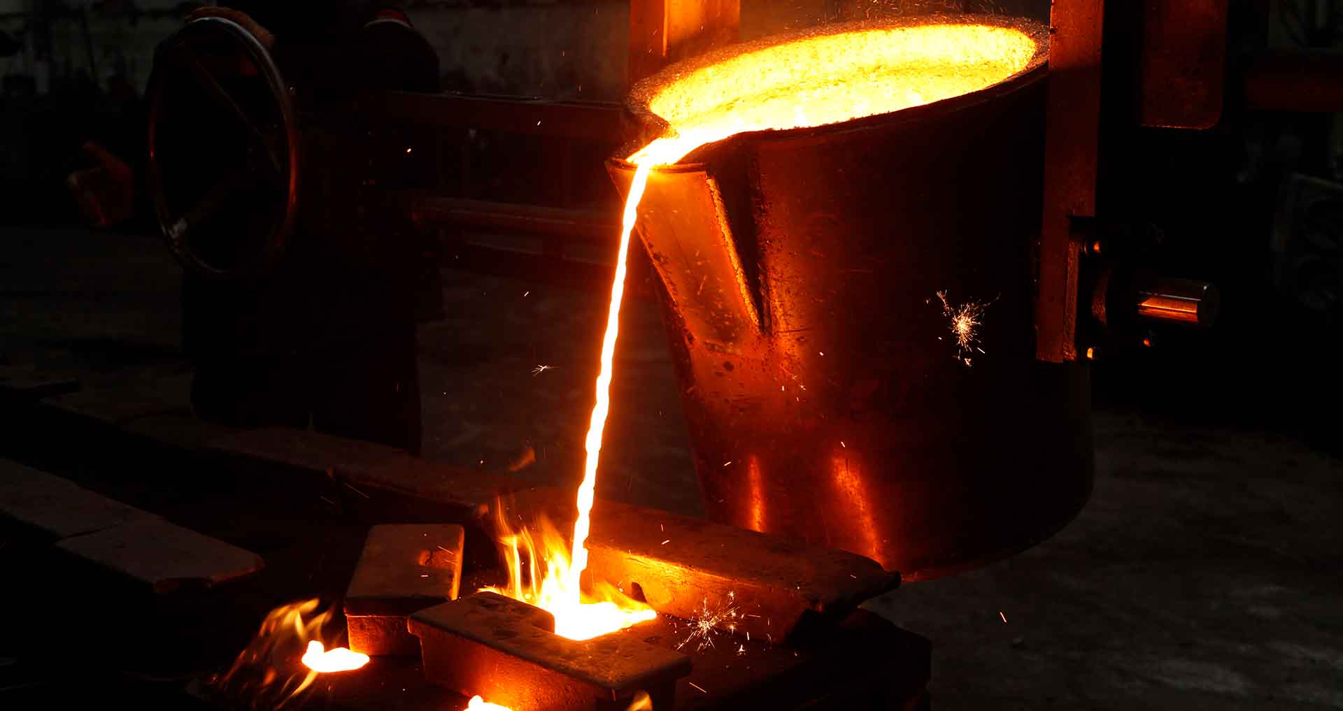 Liquid Metal Poured into Form in a Foundry